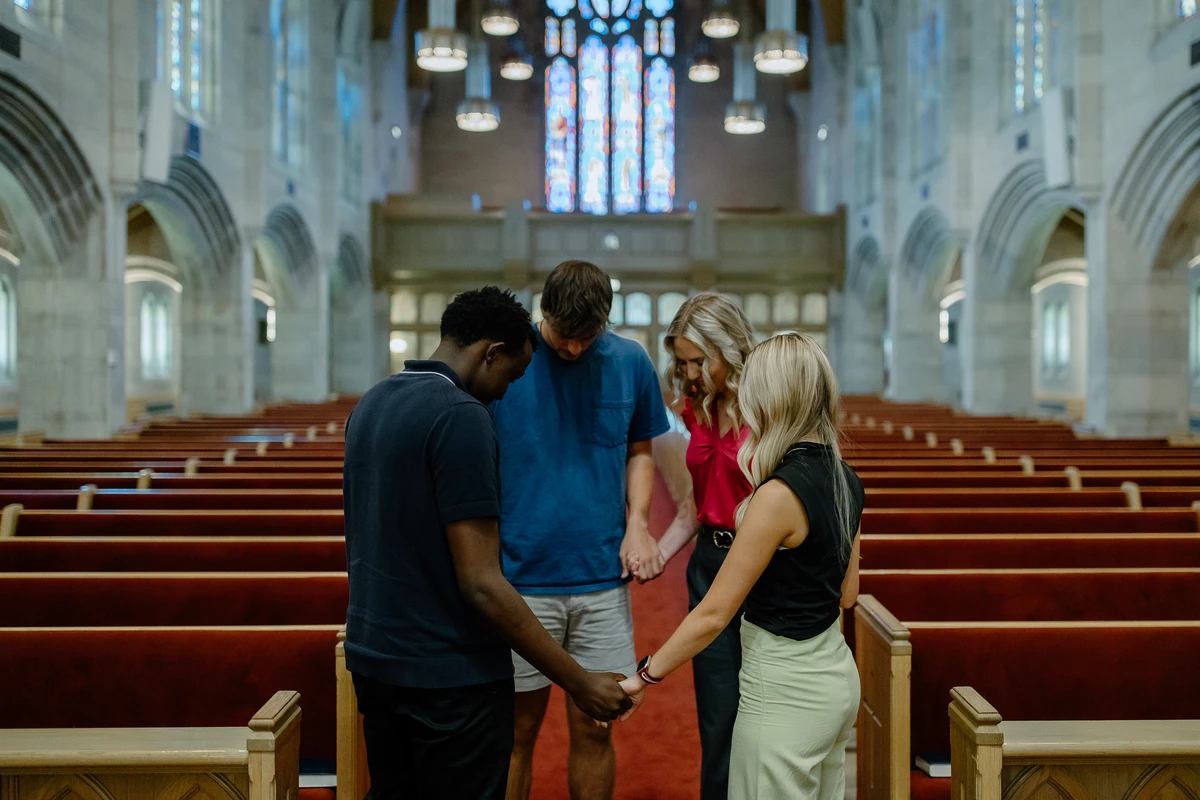 Students praying together in the chapel..